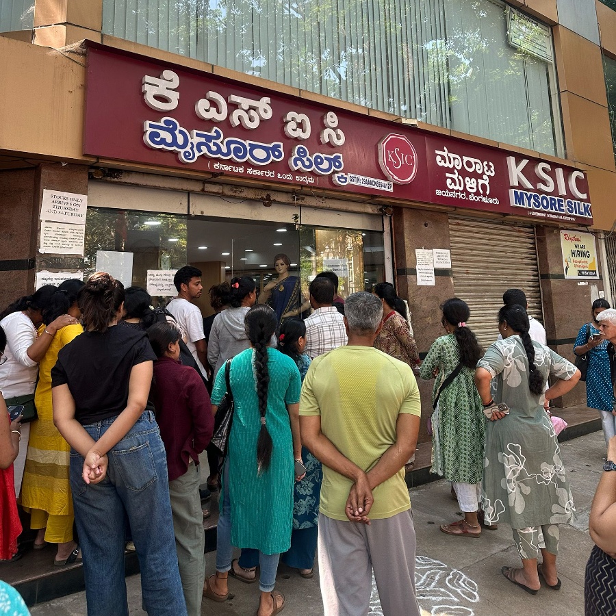 After lining up, customers get a token number to enter the store