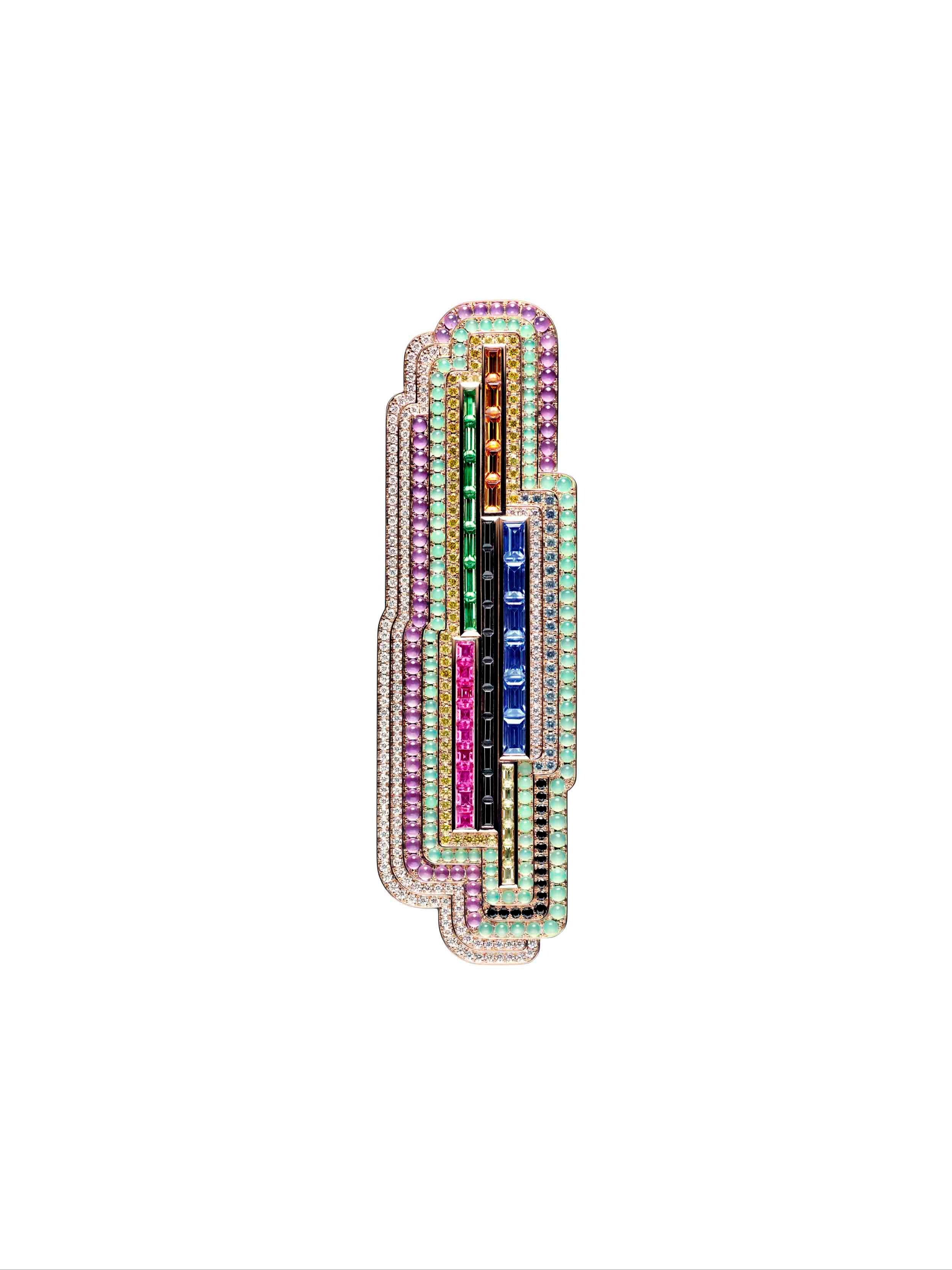 Color Flash: Rose gold brooch set with rubies, yellow, blue and green sapphires, tsavorite and spessartite garnets, black spinels, chrysoprases, amethysts, and diamonds
